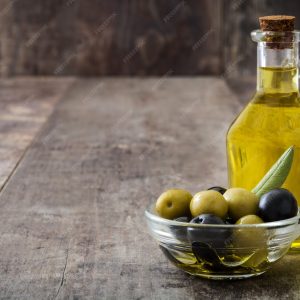 imgi_160_virgin-olive-oil-crystal-bottle-wooden-table_123827-9667